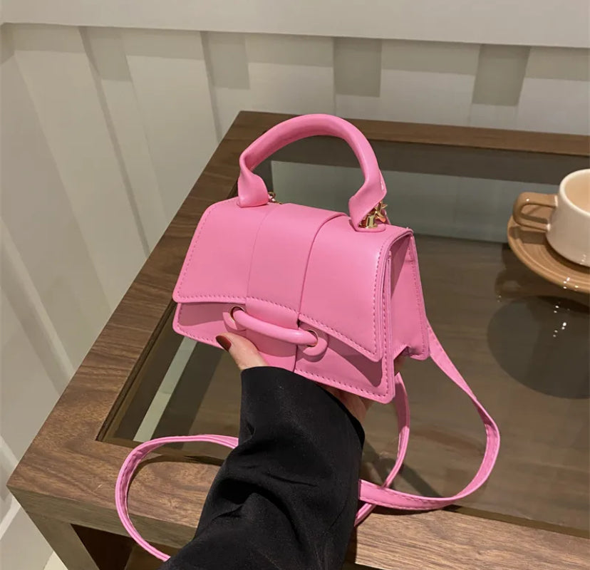 Vintage style flip over crossbody bag