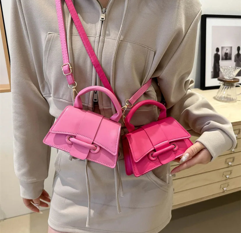 Vintage style flip over crossbody bag