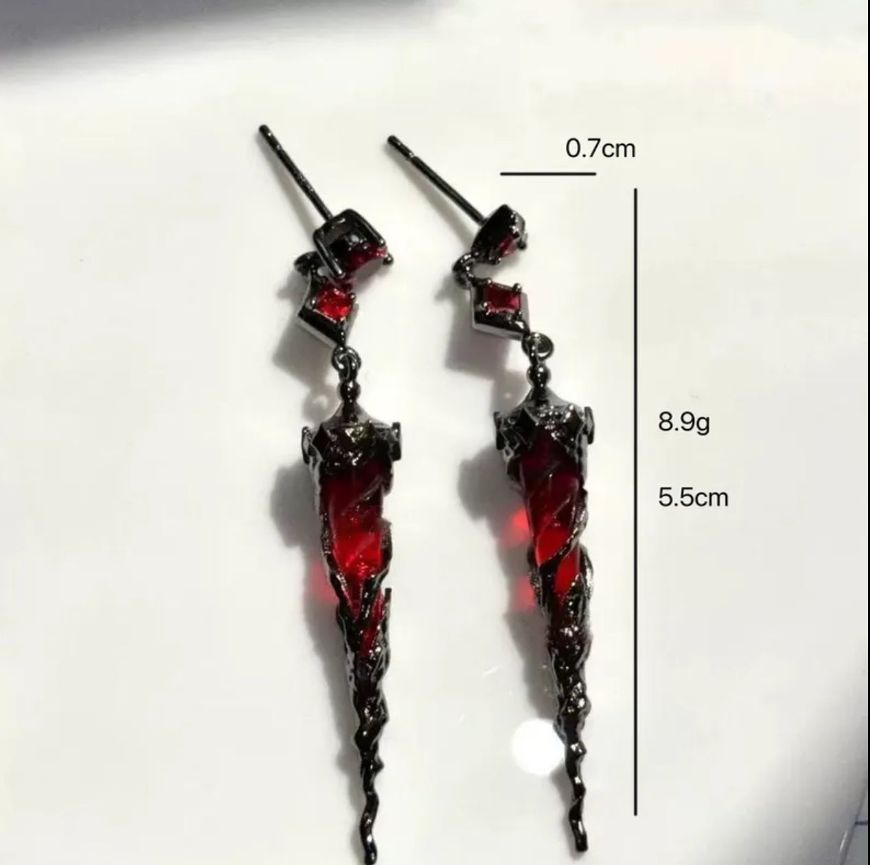 Bleeding dagger earring