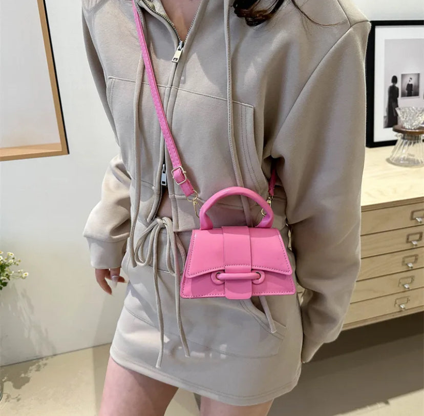 Vintage style flip over crossbody bag