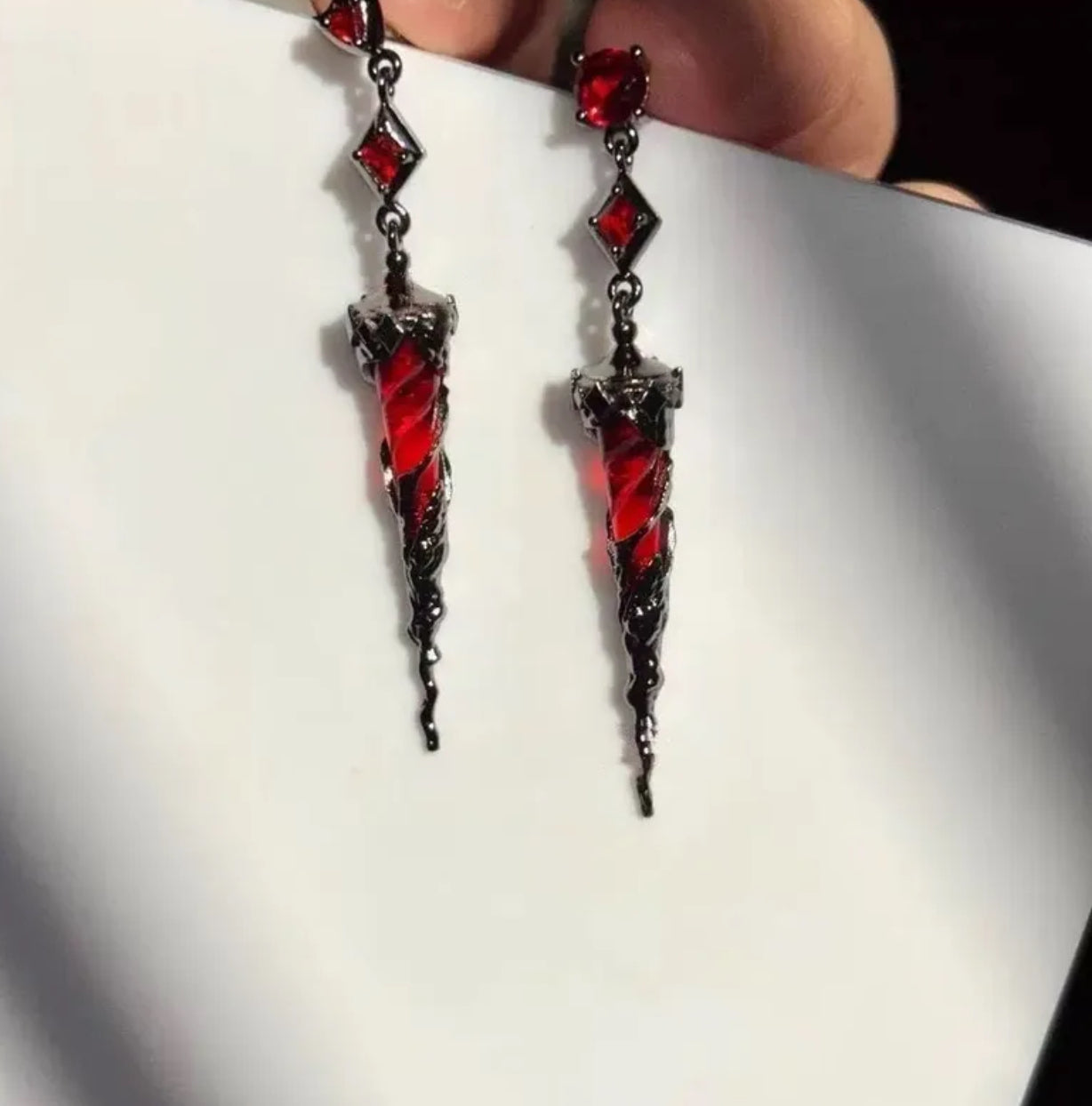 Bleeding dagger earring