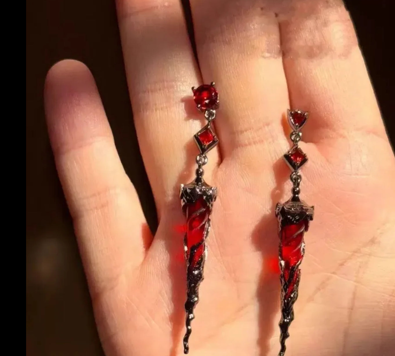 Bleeding dagger earring