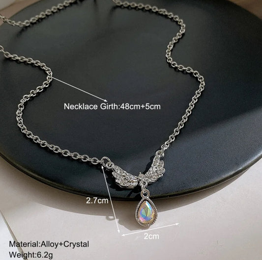 Wings rhinestone detailed pendant