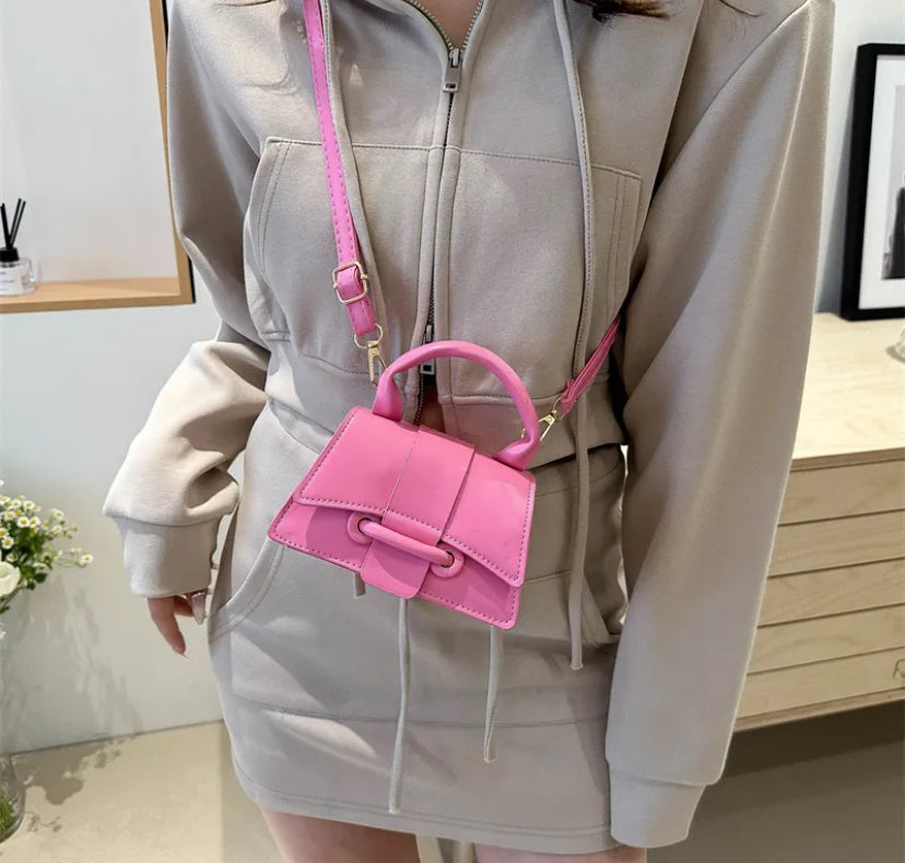 Vintage style flip over crossbody bag