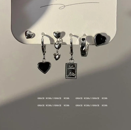 Black heart ear studs